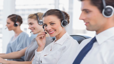 Attractive call centre agent with a headset