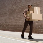 delivery-person carrying boxes